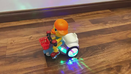 Electric Stunt Rotating Duck Tricycle Toy – Dynamic Music &amp; Lights for Baby Fun